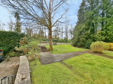 View from patio towards tennis court