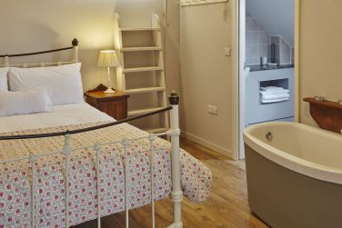 Bath or shower? Both are provided in the Apple Loft