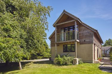 Apple Loft with glass fronted balcony for tree top views of Blackdown Hills