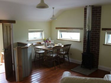 Living area with log burner - cosy in the winter!