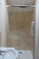 Shower cubicle, WC and wash basin