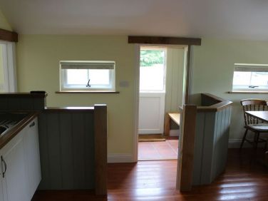 The entrance lobby leads into the kitchen area