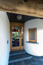 An impressive front door greets you upon arrival