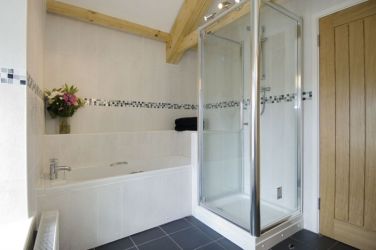 Shower room with bath and shower cubicle