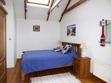 King-size bedroom on 1st floor (part of family suite)