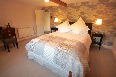 Master bedroom with king double bed.