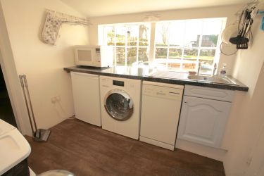 Additional appliances in the utility room.