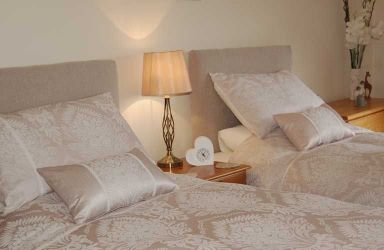 Cosy bedroom, Twin or Super King, with views out over the hills.