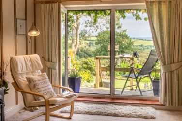 Light airy living room with wonderful views.
