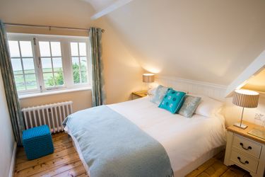 Linda's Room on the top floor has a king sized bed and the best sea views from the whole house