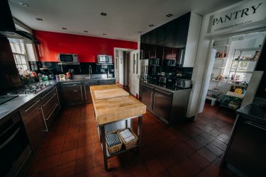 Well equipped, very modern stainless steel kitchen with 2 ovens, 2 dishwashers and walk-in pantry