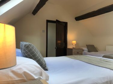 Main Bedroom showing additional single bed
