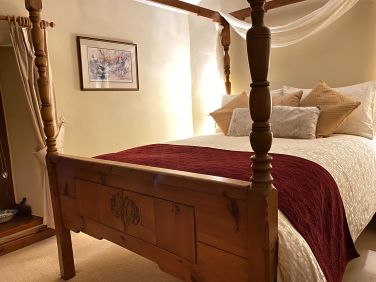 Bespoke hand carved four poster bed for that perfect romantic break