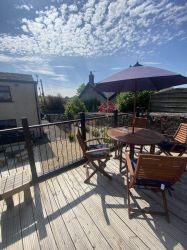 Views of the rolling hills from the mezzanine deck across from Backgate. Solar lighting