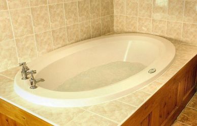 Bathroom with shower cubicle and fabulous spa bath