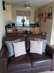 Lounge, Dining Area, & Kitchen, all you need to enjoy self catering.