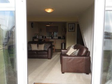 With patio doors letting the outside flood in