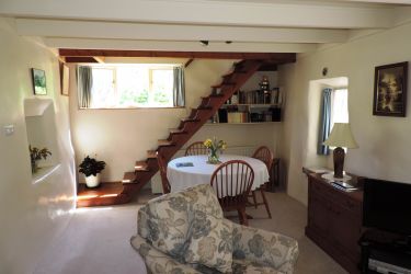 Far end leads to a landing and two bedrooms