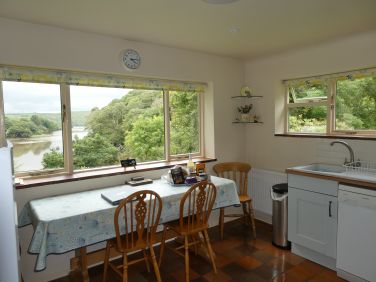 Watch egrets, greenshanks, cormorants, herons on the estuary from the kitchen window