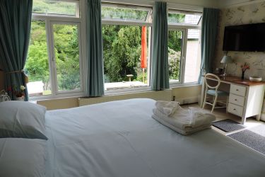 Queen size bed or two singles in the spacious Garden Room