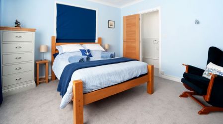 Nautical themed double bedroom with en suite.
