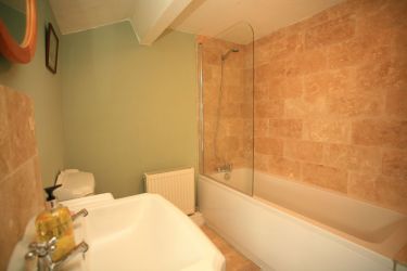 Two bathrooms, one is on the ground floor.