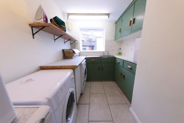Utility room for the washing machine.