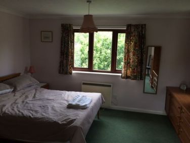 Main/family bedroom with king size bed, en suite, day bed and cot if required