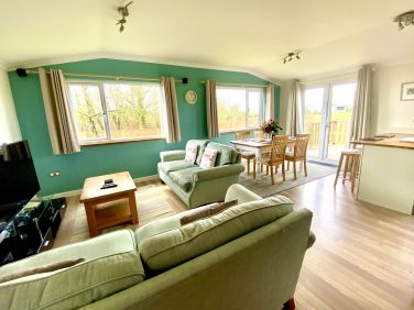 Light and airy, this beautiful countryside lodge provides a cosy base for couples and families.