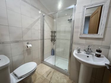 The bathroom opposite the first bedroom