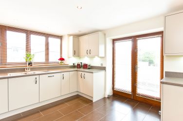 Kitchen with doors to the outside area