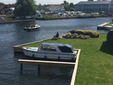 Hire a boat or kayak and explore the waterways