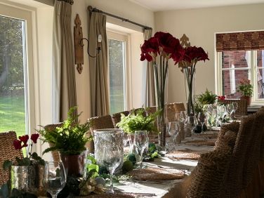 Very elegant table which can accommodate 18 easily with lovely Christmas decorations