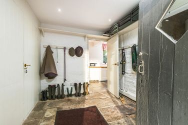 The boot room.   Great space for wellies and dogs, dog crates and sports equipment