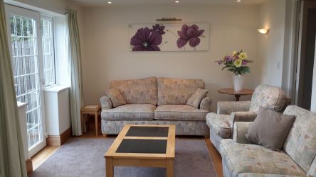 Large comfortable lounge with adjoining sitting room