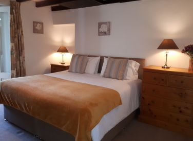 Cottage Two with a spacious bedroom and a Super-King bed