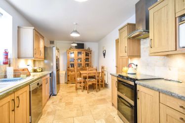 Well-equipped Kitchen with additional dining table for 4