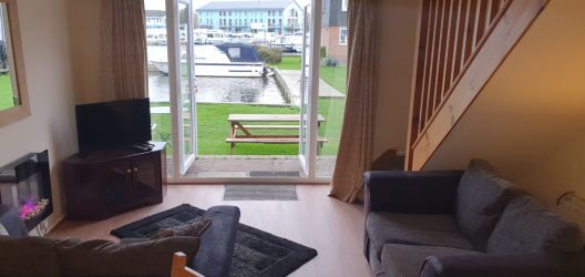 French doors open directly form living room onto private terrace