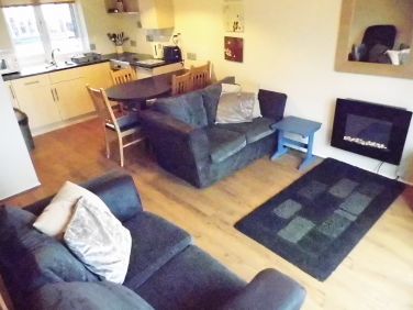 2 comfy sofas in living room.