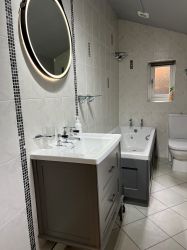 Bathroom 1 with bathtub