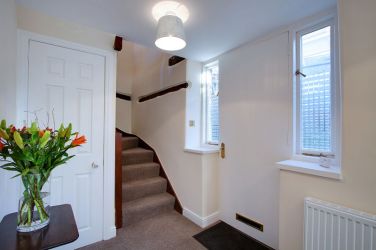 Bedrooms and on the ground floor and lounge is upstairs