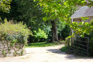 The gate at the corner of the Barn to the communal area and footpath to the Quay