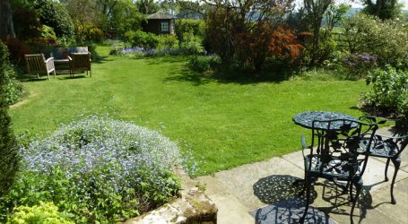 Sit back, relax and enjoy the peace and quiet in The Hayloft garden with lawns and terrace
