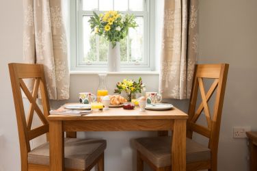 Relaxed breakfast by the window