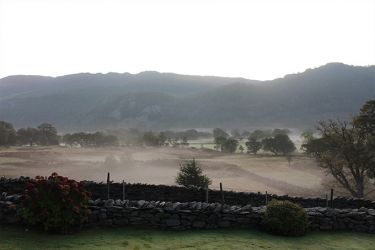 Early morning mist from Manesty Band's lawn