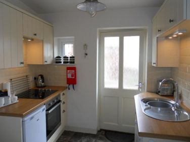 Compact Kitchen with extening worktop for extra space, D/washer, micro, fridge