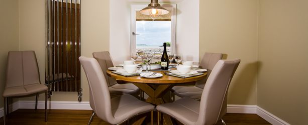 Dining table with views across the bay