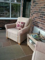 One of the comfortable chairs in the conservatory, from here you can enjoy our many bird visitors.