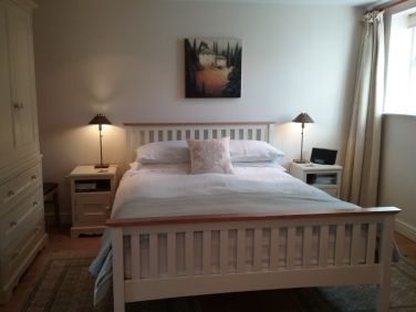 Comfortable and cosy bedroom with king size bed.