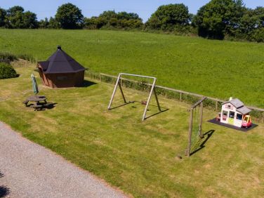 BBQ cabin and play area